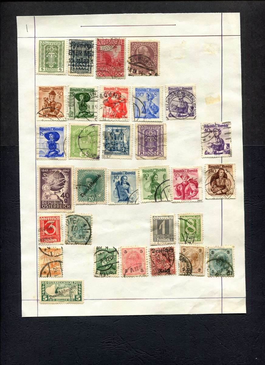 Austria - 31 Stamps Mounted (Hinged) on Old Album Page