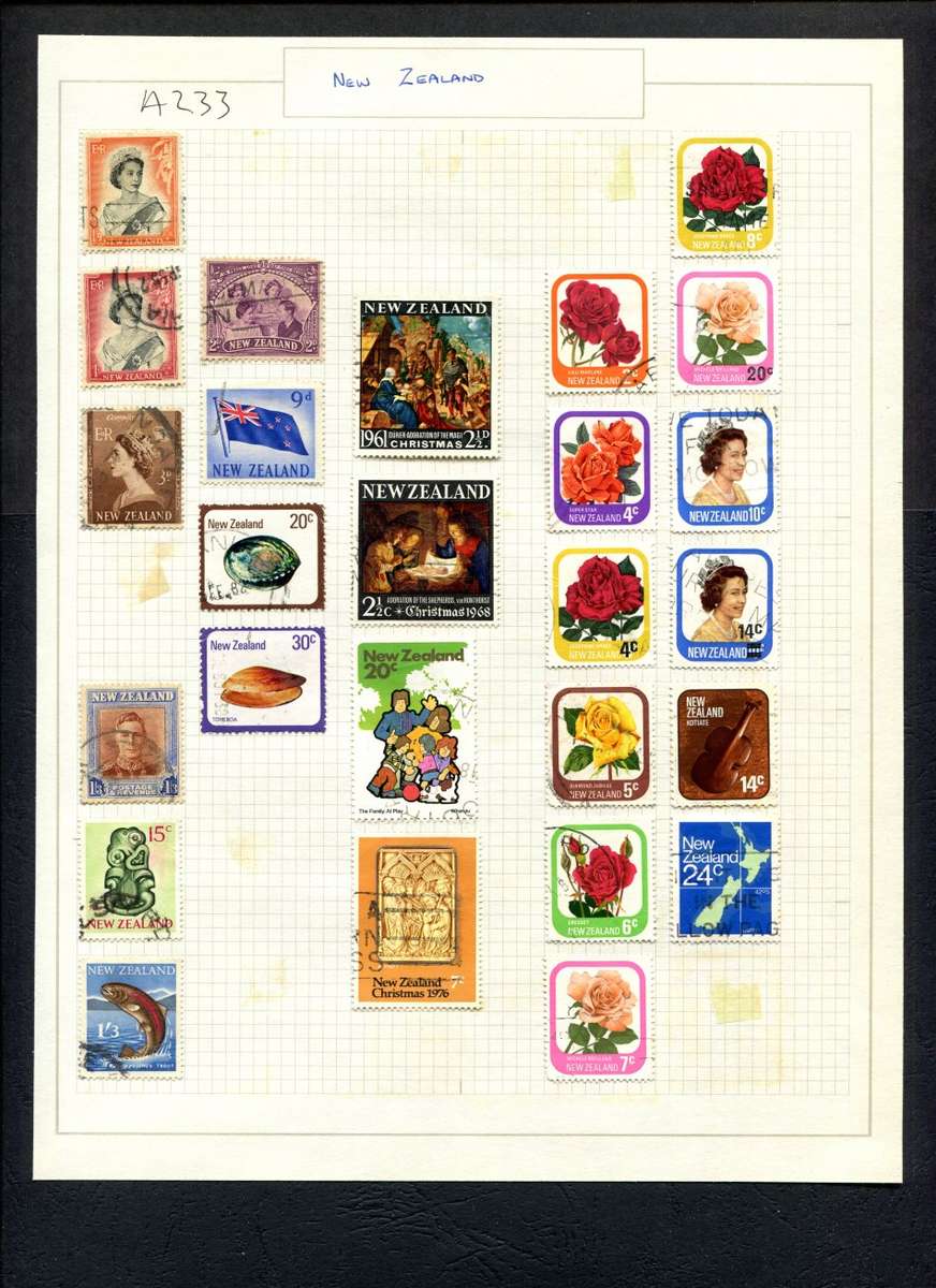 New Zealand - 26 Stamps Mounted (Hinged) on Old Album Page