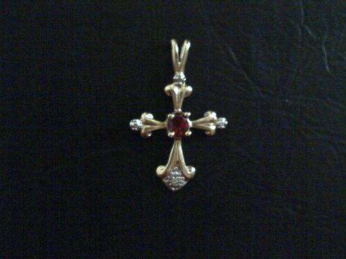 solid 9ct gold ruby and diamond cross pendant
