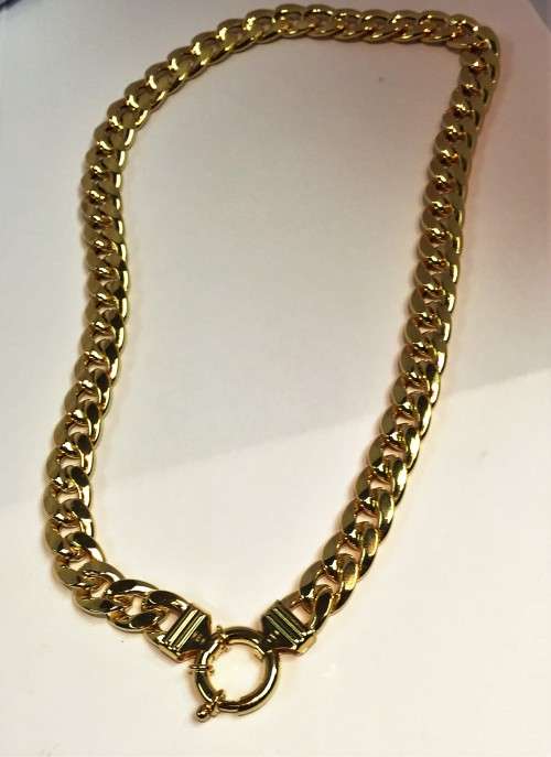 9  carat  ----- Imported Gold  Necklace Flat curb----cm 45 long - 10 mm wide,with signoretti clasp