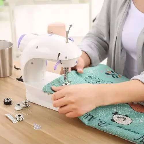 mini sewing machine with double and two speed control