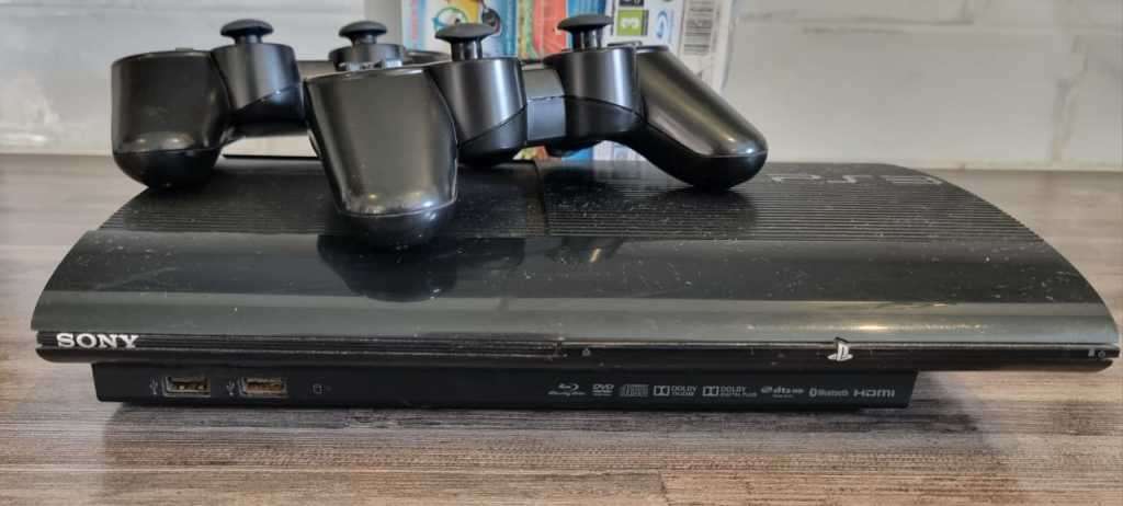 PS3 Console + 2 Controllers + 10 Games