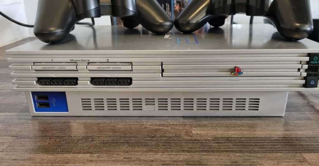 PS2 Console + 2 Controllers + 10 Games