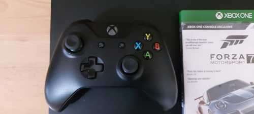 Last one. XBOX ONE X 1TB Console + Controller + Game Excellent working condition