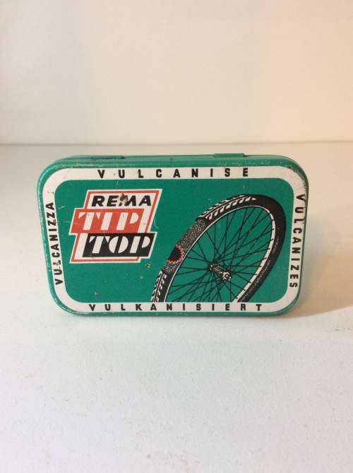 OLD REMA TIP TOP TIN