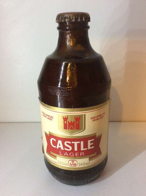 OLD CASTLE DUMPIE BOTTLE - STILL SEALED AND FULL - THOSE WERE THE DAYS -