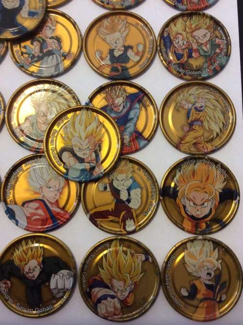 32 GOLD METAL 2003 DRAGONBAL Z  TAZOS - RARE FIND - ALL ONE BID -