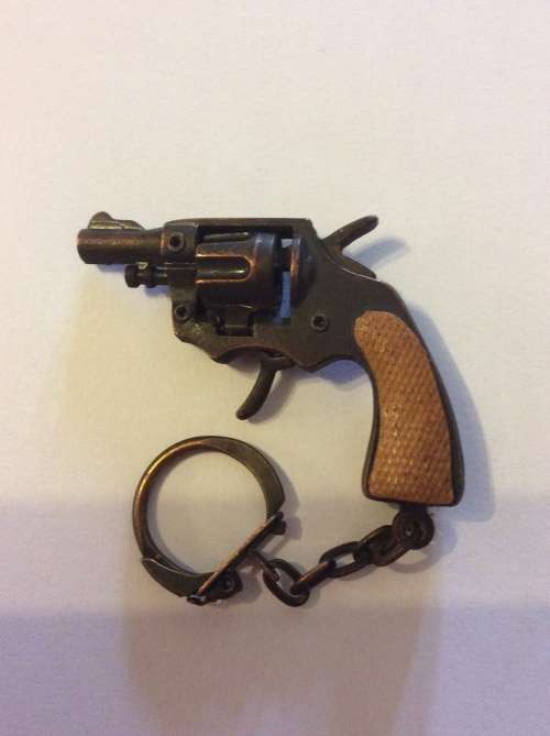 VINTAGE KEY RING  CAP GUN - SOLID METAL & WORKS 100% - GREAT OLD TOY -