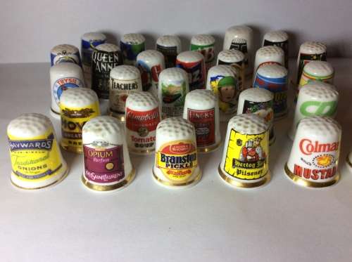 35 CERAMIC THIMBLES WITH GREAT SUBJECT MATTER - BID PER THIMBLE TO TAKE ALL 35 -