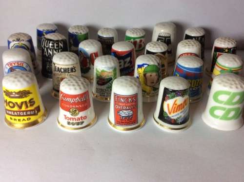 35 CERAMIC THIMBLES WITH GREAT SUBJECT MATTER - BID PER THIMBLE TO TAKE ALL 35 -