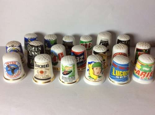 35 CERAMIC THIMBLES WITH GREAT SUBJECT MATTER - BID PER THIMBLE TO TAKE ALL 35 -