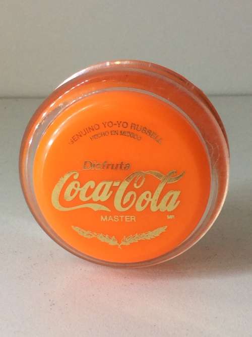 RUSSELL YO YO - MADE IN MEXICO ORANGE WITH GOLD WRITING -