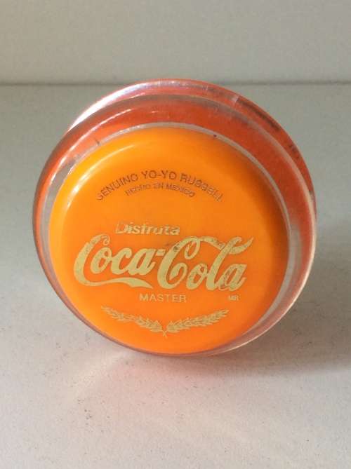 RUSSELL YO YO - MADE IN MEXICO ORANGE WITH GOLD WRITING -