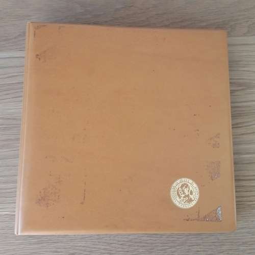 Coin Collectors Book with sleeves and some Coins