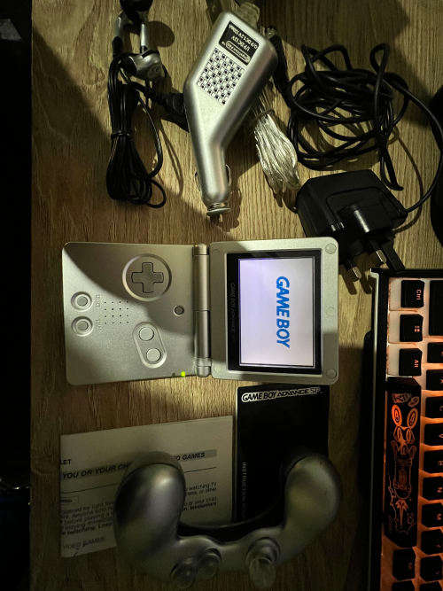 Gameboy Advance SP (AGS-001) with box and manuals