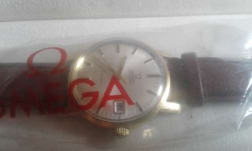 18 CT OMEGA AUTOMATIC GENEVA MEN,S WATCH IN BOX IN 100 % WORKING CONDITION