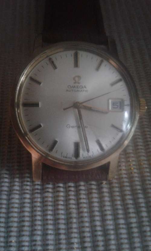 18 CT OMEGA AUTOMATIC GENEVA MEN,S WATCH IN BOX IN 100 % WORKING CONDITION