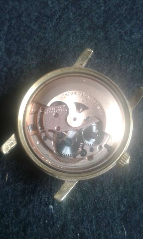 18 CT OMEGA AUTOMATIC GENEVA MEN,S WATCH IN BOX IN 100 % WORKING CONDITION