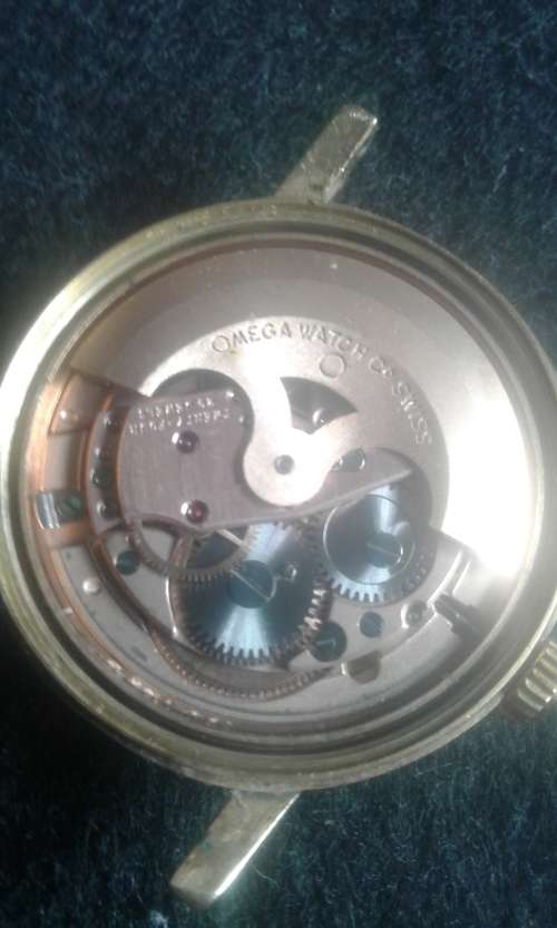 18 CT OMEGA AUTOMATIC GENEVA MEN,S WATCH IN BOX IN 100 % WORKING CONDITION