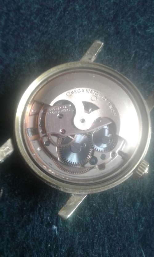 18 CT OMEGA AUTOMATIC GENEVA MEN,S WATCH IN BOX IN 100 % WORKING CONDITION