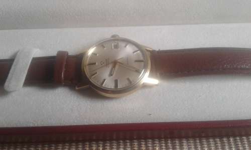 18 CT OMEGA AUTOMATIC GENEVA MEN,S WATCH IN BOX IN 100 % WORKING CONDITION