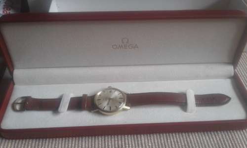 18 CT OMEGA AUTOMATIC GENEVA MEN,S WATCH IN BOX IN 100 % WORKING CONDITION