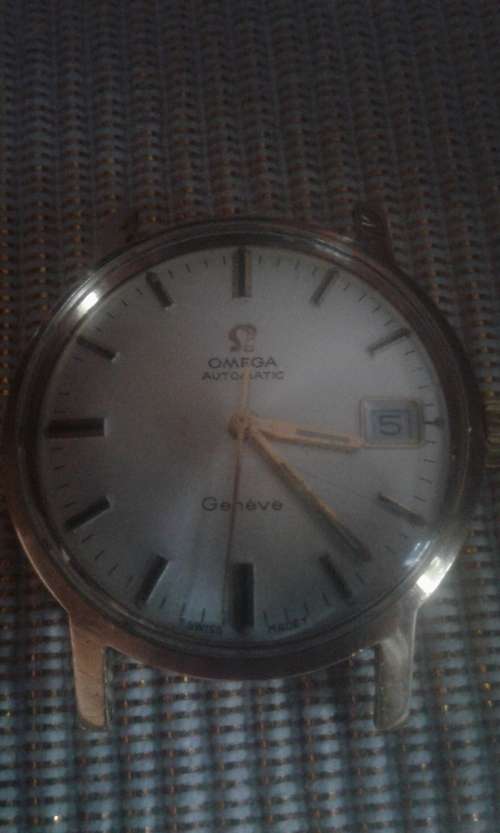 18 CT OMEGA AUTOMATIC GENEVA MEN,S WATCH IN BOX IN 100 % WORKING CONDITION