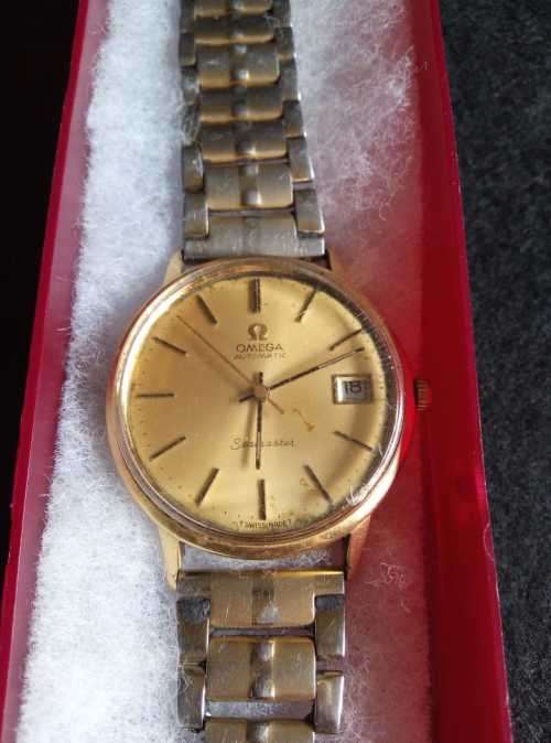 18 CT OMEGA SEAMASTER AUTOMATIC SOLID GOLD WATCH need  a service not running