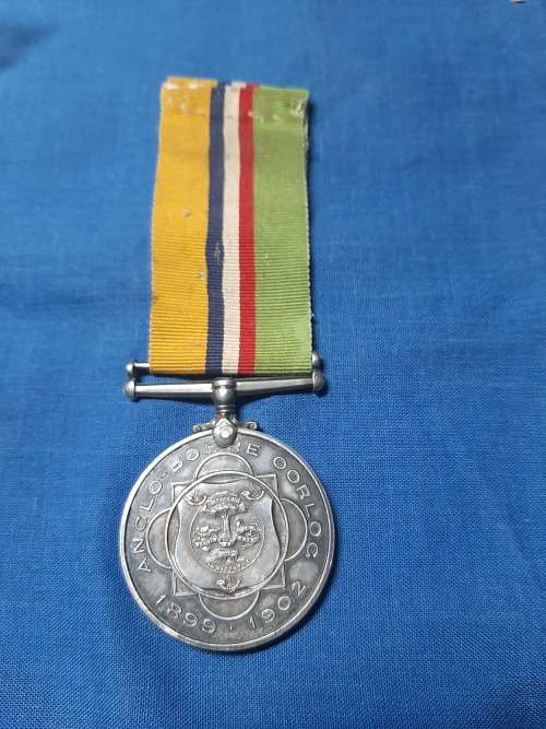 1 x War Medal and Silver 5 Shielling,s all for 1 bidding