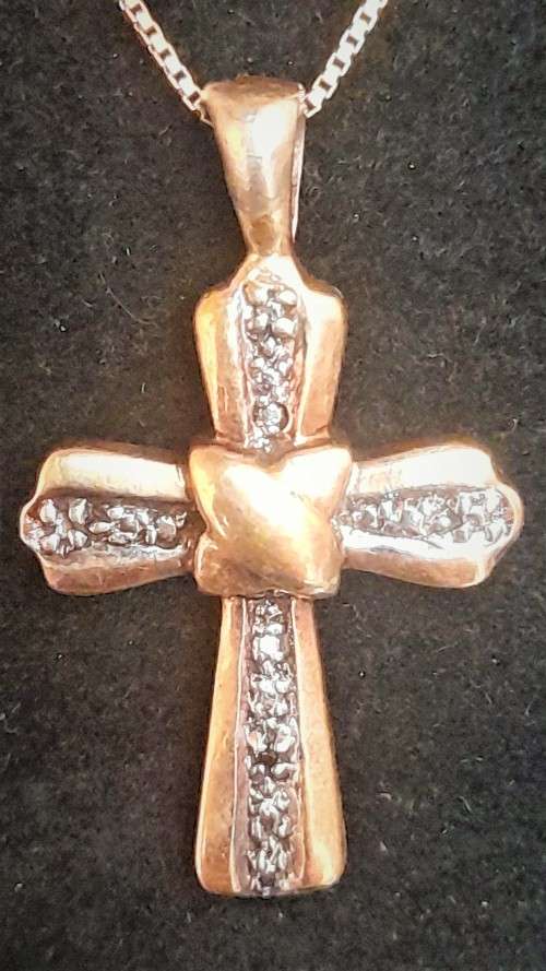 Lovely 9 Carat `Gold Cross and Chain` with small Diamond.