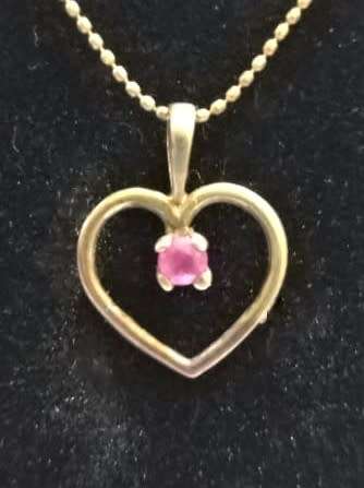 Genuine `RUBY` Heart Pendant and Chain set in 9 Carat Solid Gold.