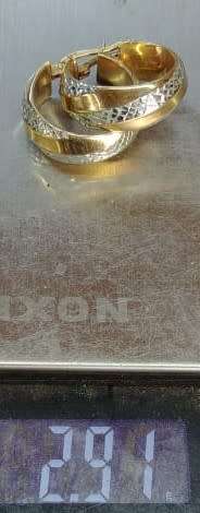 Designer `Diamond cut Design` earrings set in 9 Carat Yellow and White Hollow Gold.