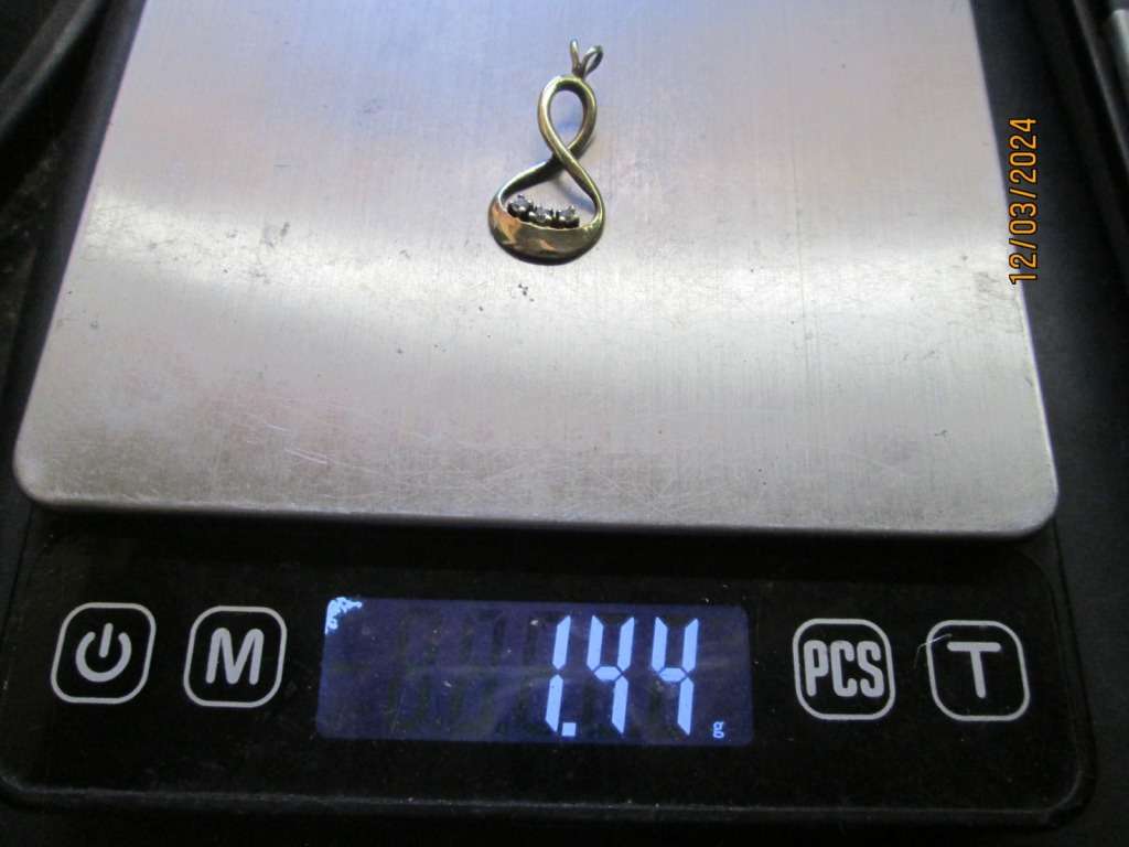 `INFINITY PENDANT` set with 3 X 0.05 Carat Natural Diamonds, set in 9ct Yellow Gold