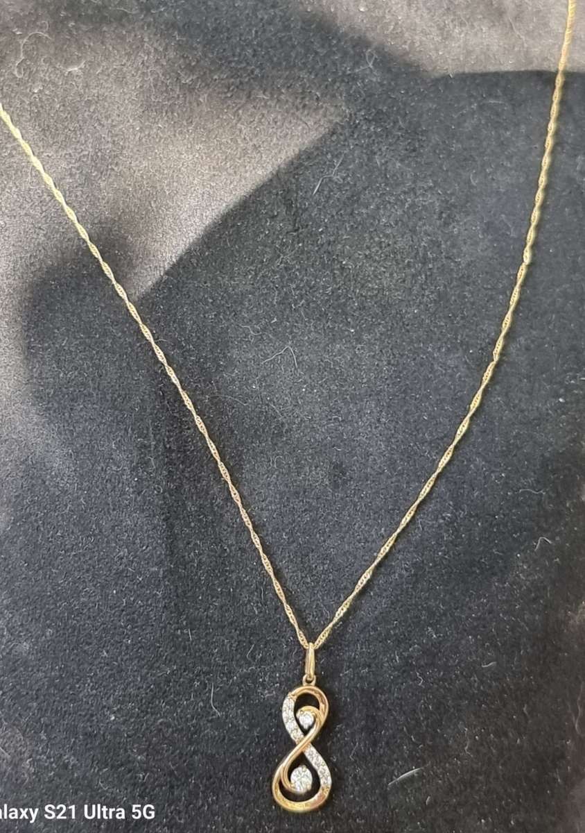 CZ Infinity Pendant 9CT Yellow Gold on a Rope Chain Necklace. ( Genuine Gold)