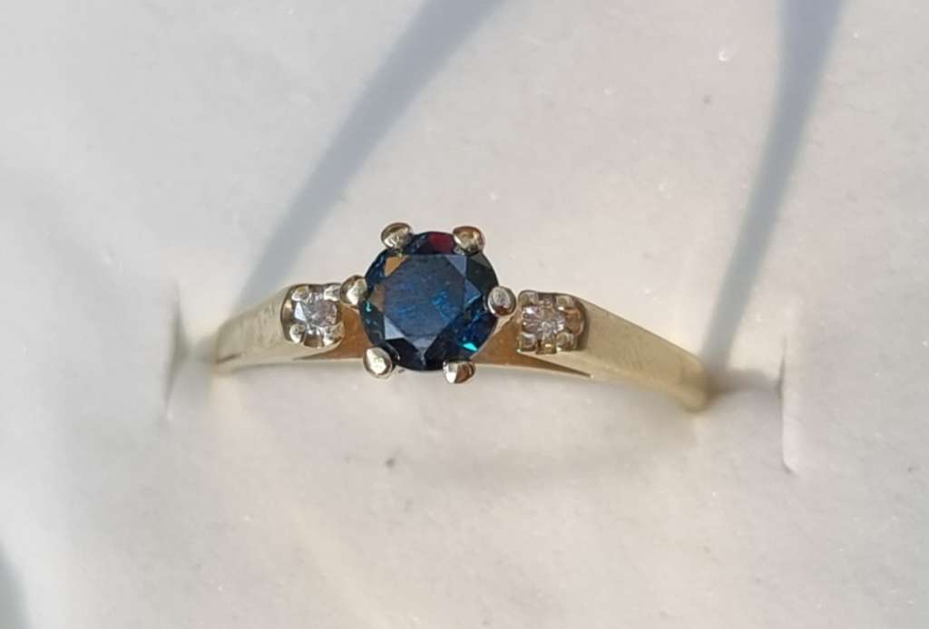 0.56 carat certified fancy blue natural diamond set in 9ct gold