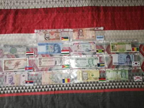 Lot of 70 International Bank Notes