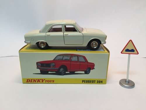 Atlas Edition - Dinky Toys 1428 Diecast PEUGEOT 304 white with sign