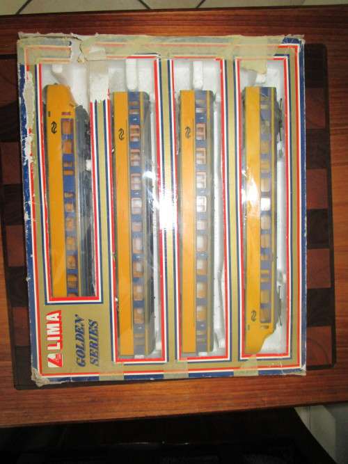 Nine LIMA model trains (two locomotives and seven cars sold as one package + 20 tracks)