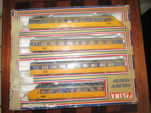 Nine LIMA model trains (two locomotives and seven cars sold as one package + 20 tracks)