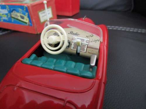 Two model cars - one Shuco Radio 4012 and one Austin model