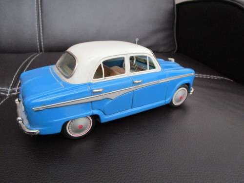 Two model cars - one Shuco Radio 4012 and one Austin model