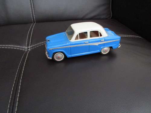 Two model cars - one Shuco Radio 4012 and one Austin model