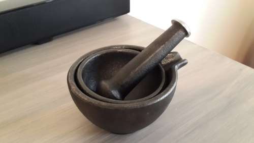 Vintage Oriental cast iron mortar and pestle