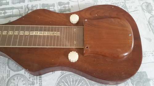 Weird vintage custom made guitar and case.