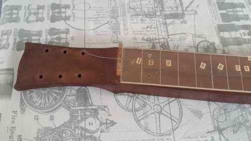 Weird vintage custom made guitar and case.