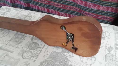 Weird vintage custom made guitar and case.