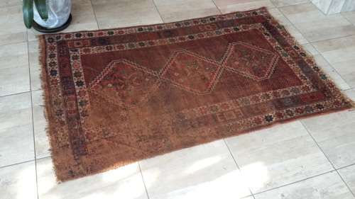 Beautifully lived-in handknotted Persian carpet