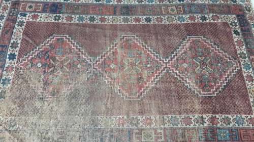 Beautifully lived-in handknotted Persian carpet