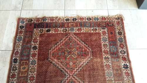 Beautifully lived-in handknotted Persian carpet