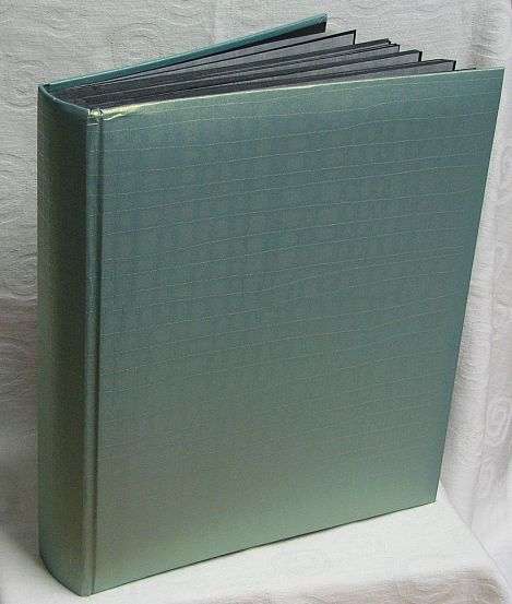 PHOTOGRAPH ALBUM (HENZO) - Black Pages with Glassine Tissue between the pages